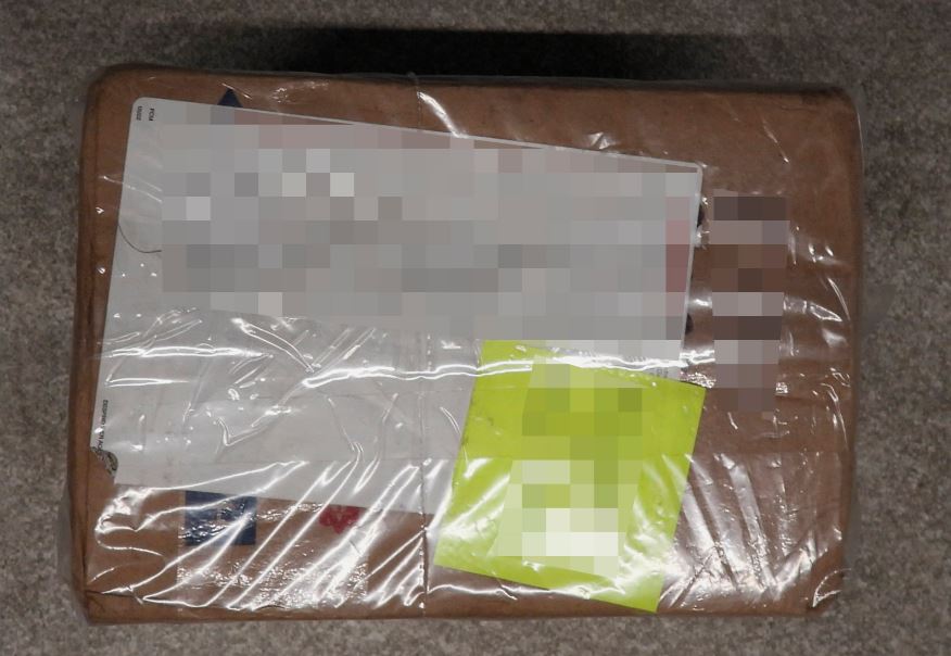 Foto: Cortesía Aseguran kilo y medio de drogas en empresa de paquetería en Puebla