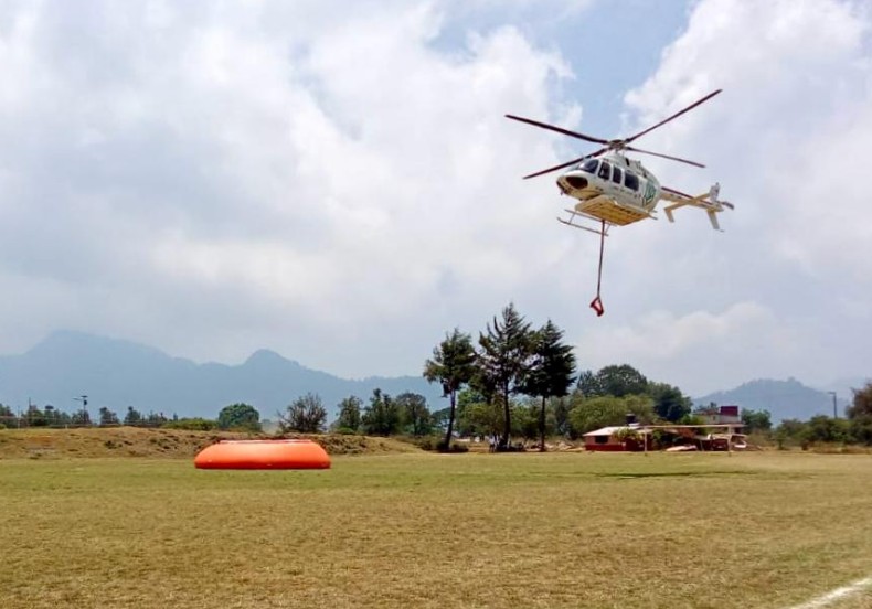 Foto: Cortesía Supervisan desde el aire incendio forestal en Jilotzingo, Zacatlán