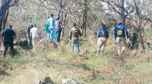 Hallan cuerpo envuelto en bolsas en Tetla; investigan conexión violenta