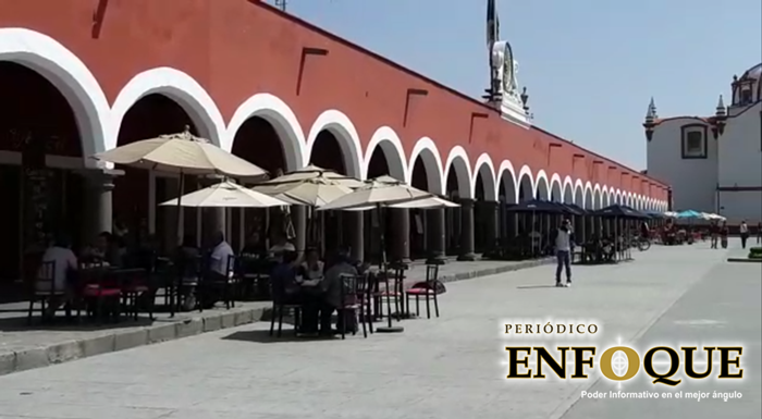 Captura de pantalla  Reabren servicio de mesa algunos locales del Portal Guerrero en Cholula