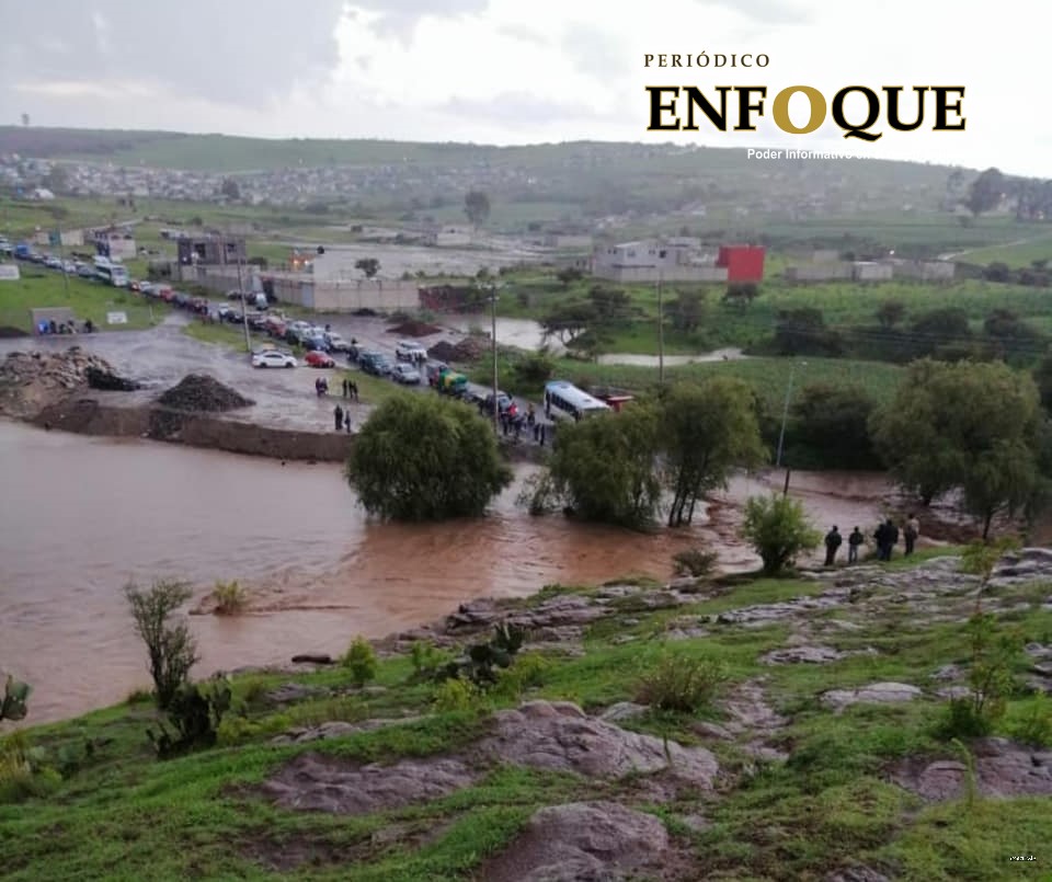 Foto: Cortesía Inicia Ayuntamiento de Puebla trabajos de limpia en Azumiatla tras fuerte lluvia
