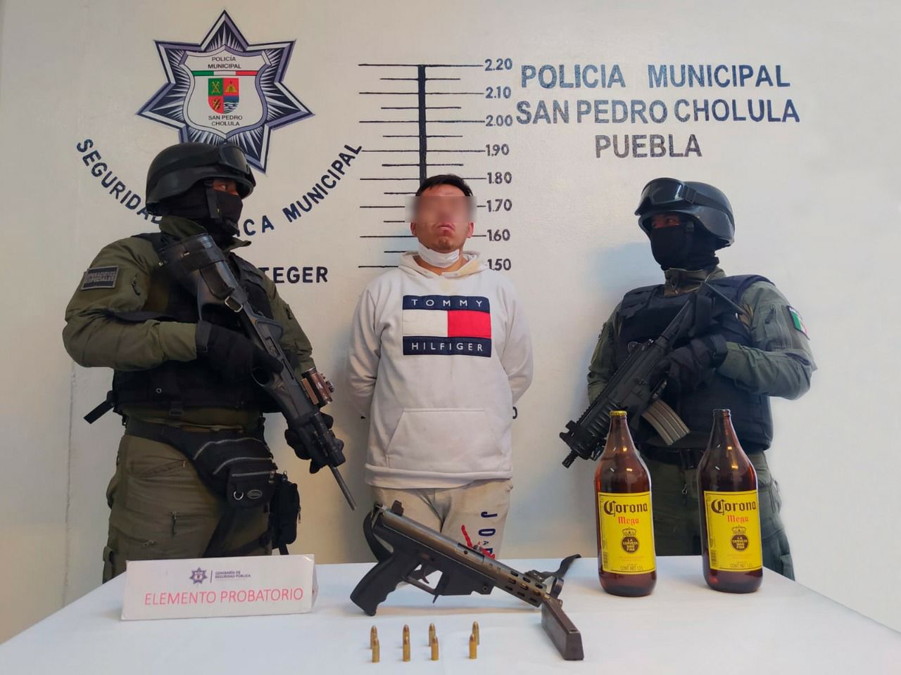 Foto: Cortesía Detiene policía de San Pedro Cholula a hombre por portación de arma de fuego que detonó en cremación de un familiar
