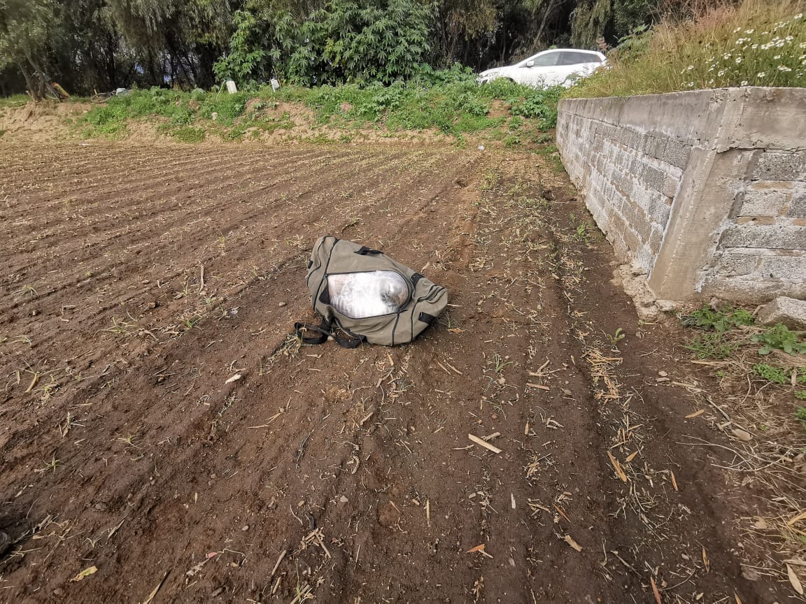 Abandonan maleta y en su interior el cadáver de una persona, en Nativitas 
