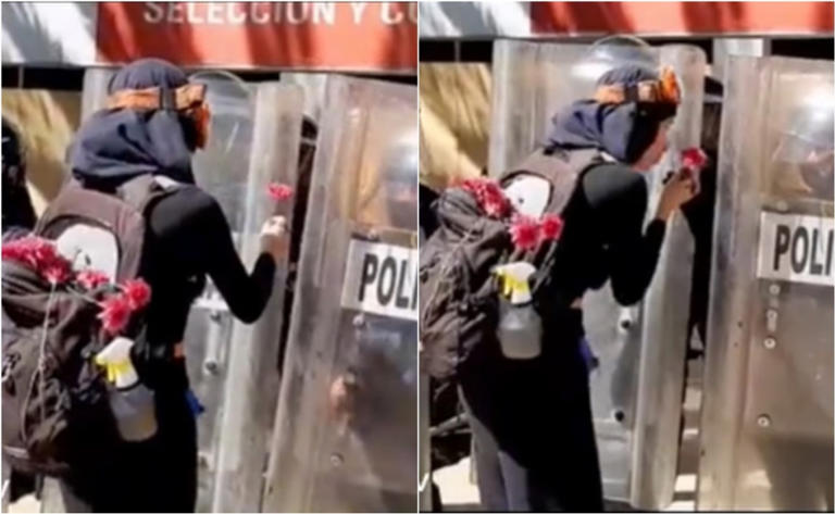 Por: Cortesía Feminista agradece a policías en marcha del 8M con una flor y beso en la mano, incidente se hace viral (Vídeo)